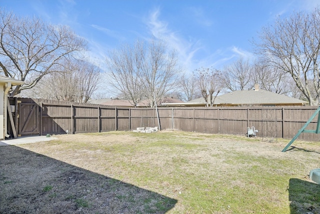 view of yard featuring a fenced backyard