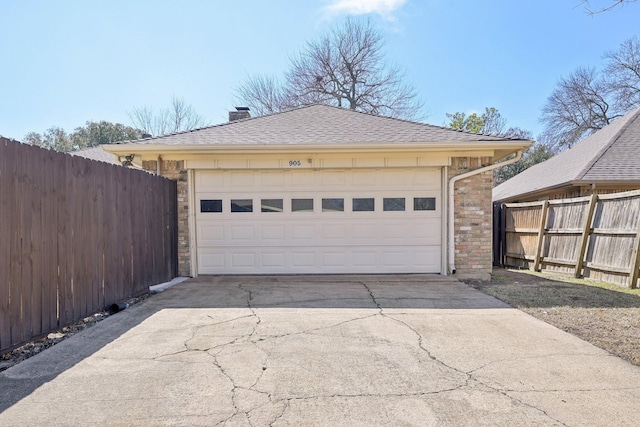 detached garage with fence