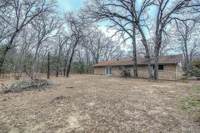 view of yard with central AC