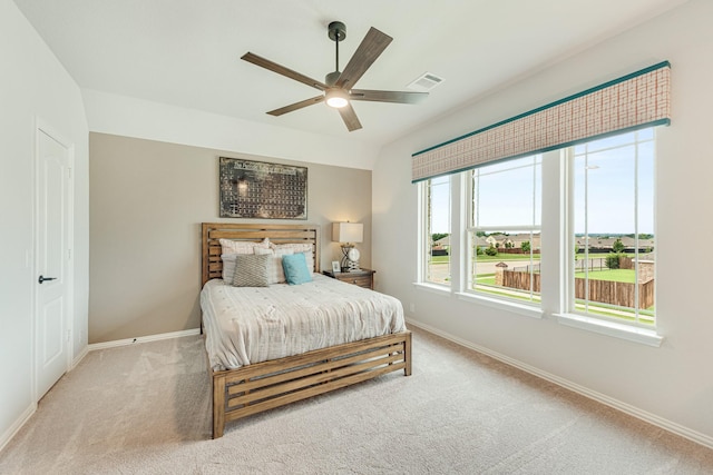 bedroom featuring carpet, visible vents, ceiling fan, and baseboards