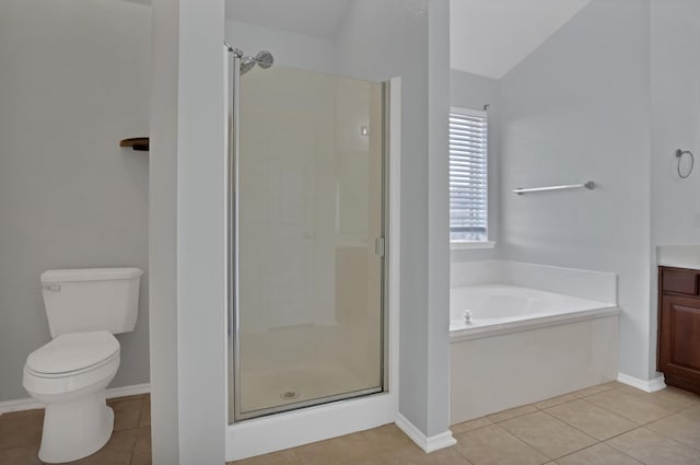 bathroom featuring toilet, a stall shower, vanity, tile patterned flooring, and a bath