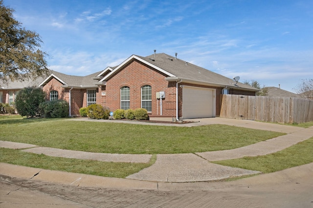 single story home with driveway, fence, a front lawn, and brick siding