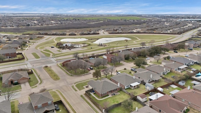 aerial view featuring view of golf course and a residential view