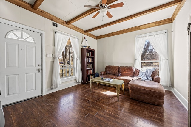 foyer entrance with ceiling fan, hardwood / wood-style floors, beamed ceiling, and baseboards