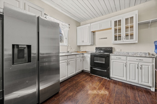 kitchen with wood ceiling, black electric range, stainless steel fridge, and white cabinetry