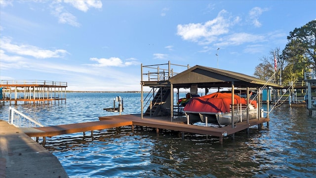 view of dock with a water view and boat lift