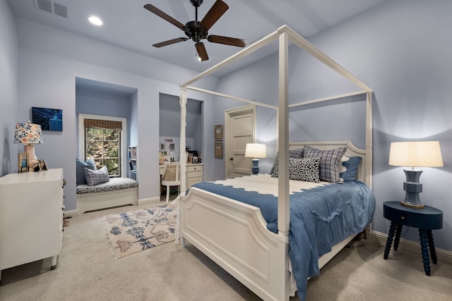 bedroom featuring baseboards, visible vents, and light colored carpet