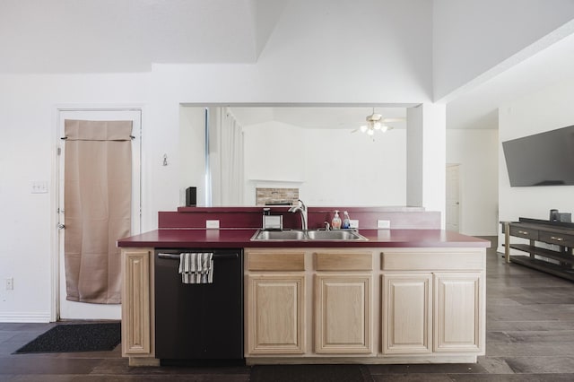 kitchen featuring dishwasher, dark wood-style floors, open floor plan, light brown cabinets, and a sink