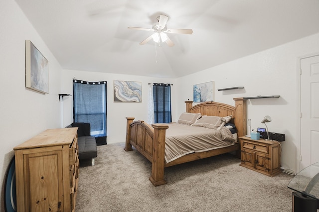 bedroom featuring lofted ceiling, ceiling fan, and light colored carpet