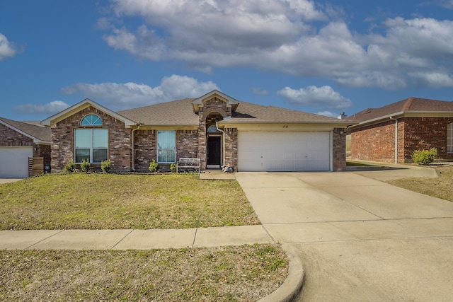 single story home featuring a garage, concrete driveway, roof with shingles, a front yard, and brick siding