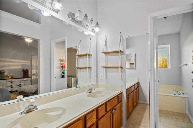 full bath with tile patterned flooring, a sink, a bath, and double vanity