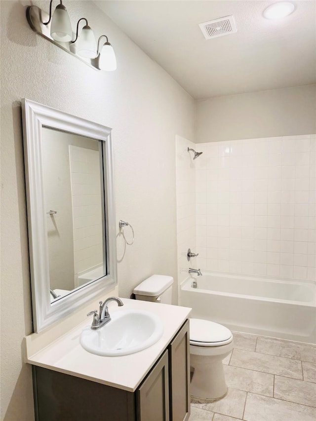 bathroom with  shower combination, visible vents, vanity, and toilet