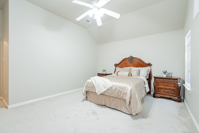 bedroom featuring lofted ceiling, carpet floors, visible vents, and baseboards