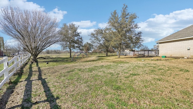 view of yard featuring fence