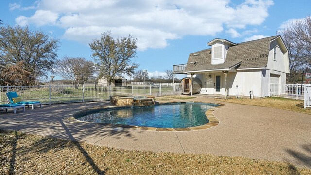 14017 NW Ct, Haslet, TX 76052 - view of pool featuring a fenced backyard, a pool with connected hot tub, and a patio