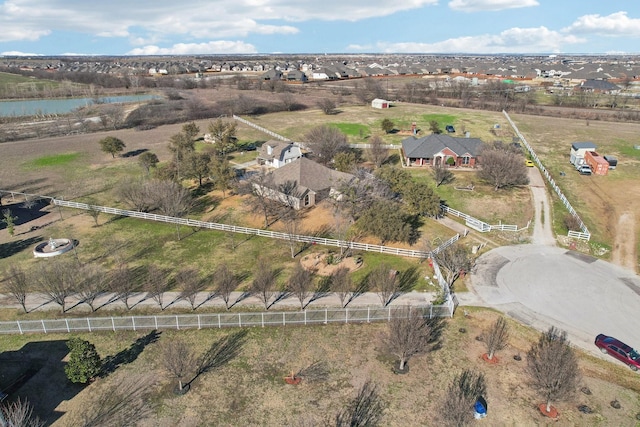 aerial view featuring a rural view and a water view