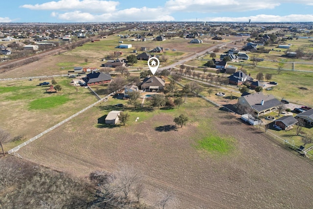 birds eye view of property featuring a residential view and a rural view