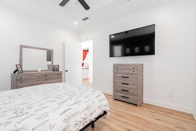 bedroom featuring light wood-type flooring, visible vents, baseboards, and recessed lighting