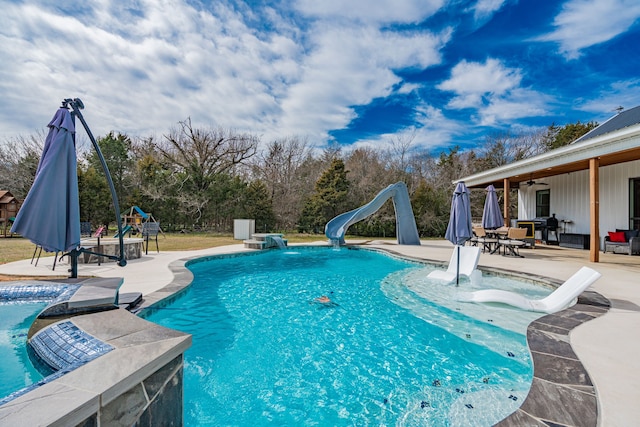 outdoor pool featuring ceiling fan, a playground, a water slide, and a patio