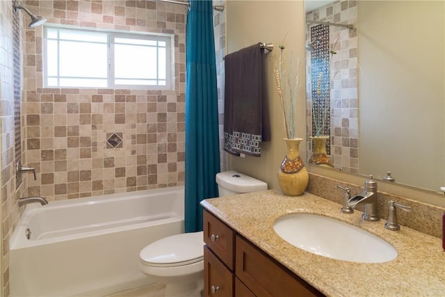 bathroom with toilet, shower / tub combo, and vanity