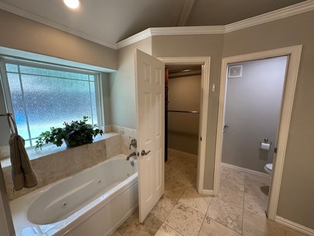 8701 Woodstream Dr, Frisco, TX 75034 - full bathroom with a tub with jets, crown molding, and tile patterned flooring