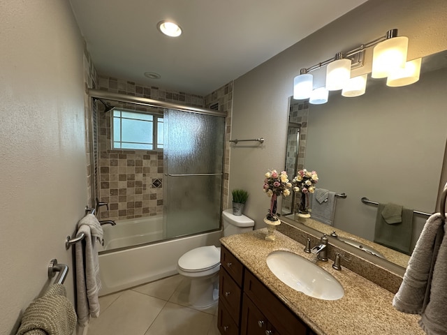 8701 Woodstream Dr, Frisco, TX 75034 - full bathroom with vanity, bath / shower combo with glass door, and tile patterned flooring