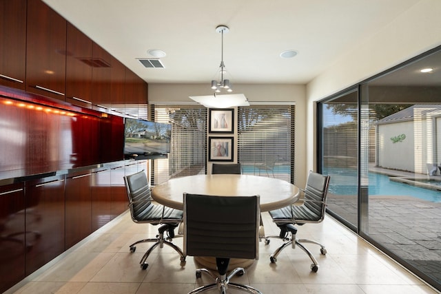 office with visible vents and light tile patterned floors