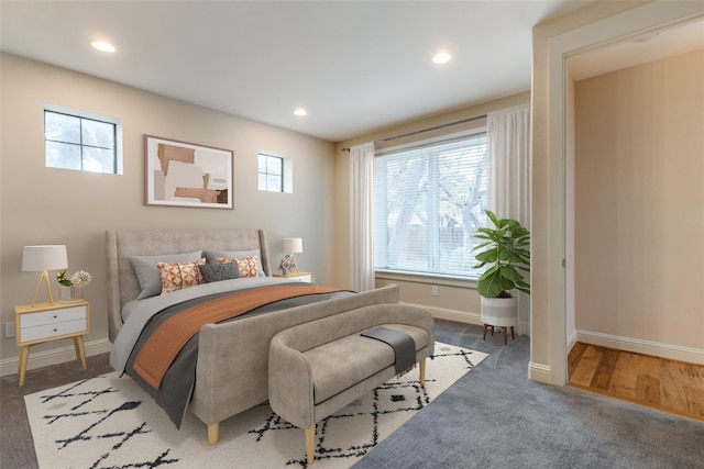 bedroom with carpet floors, baseboards, and recessed lighting