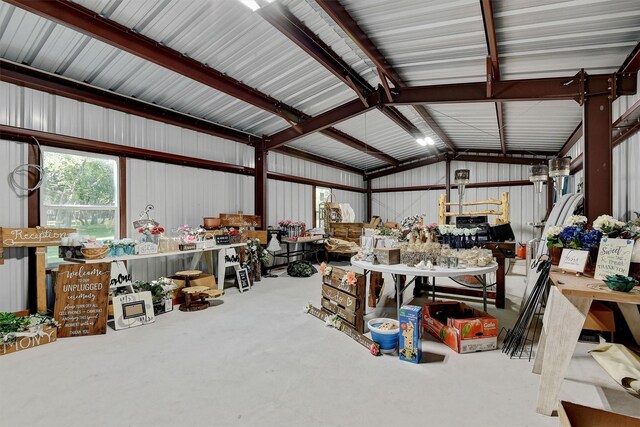 297 Cemetery Rd, Pottsboro, TX 75076 - garage with metal wall and a workshop area