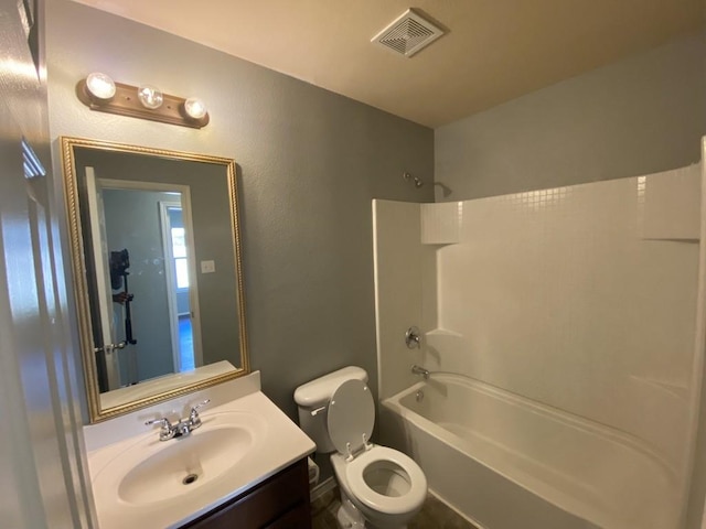 full bath featuring shower / washtub combination, visible vents, vanity, and toilet