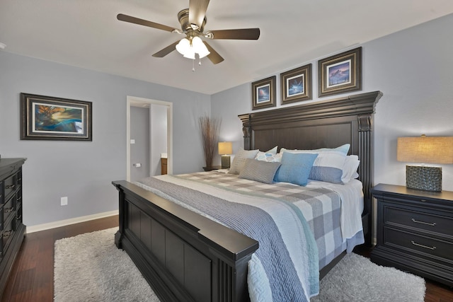 bedroom with dark wood-type flooring, baseboards, and a ceiling fan