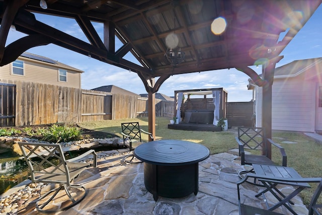 view of patio / terrace featuring a fenced backyard and a gazebo