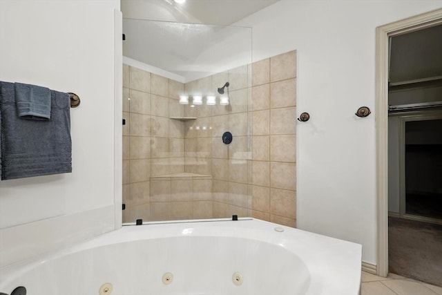 full bath with a tile shower, a whirlpool tub, and tile patterned floors