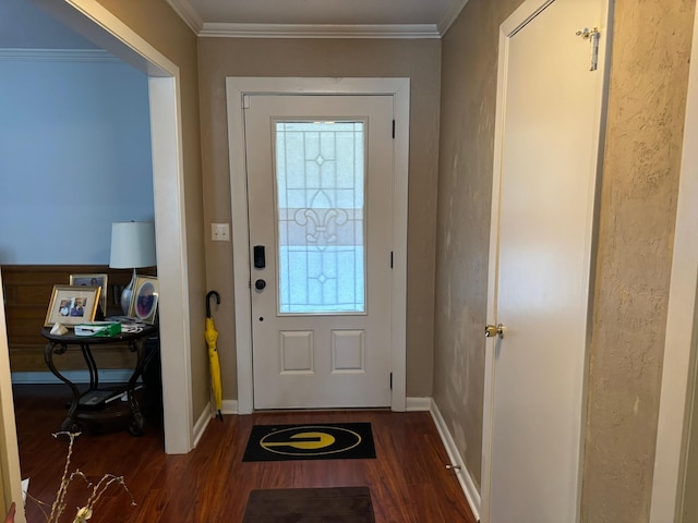 doorway to outside featuring dark wood-style floors, baseboards, and crown molding