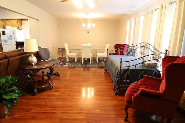8418 W Wilderness Way, Shreveport, LA 71106 - bedroom featuring an inviting chandelier, crown molding, white fridge with ice dispenser, and wood finished floors