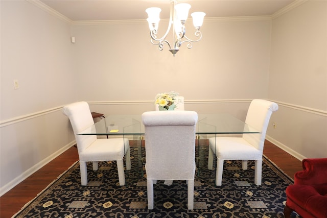 8418 W Wilderness Way, Shreveport, LA 71106 - dining space featuring baseboards, ornamental molding, wood finished floors, and an inviting chandelier