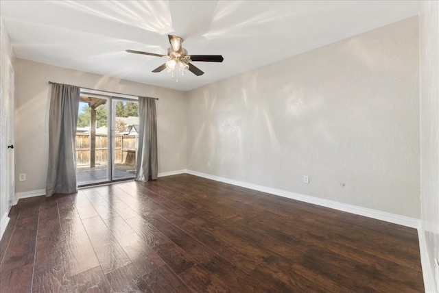 spare room with a ceiling fan, baseboards, and hardwood / wood-style floors