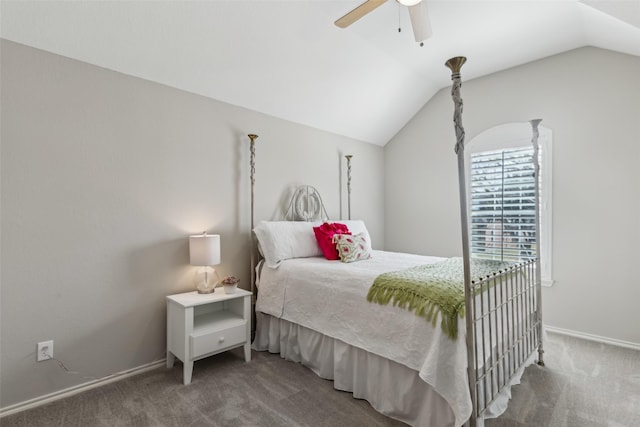 carpeted bedroom with lofted ceiling, baseboards, and a ceiling fan