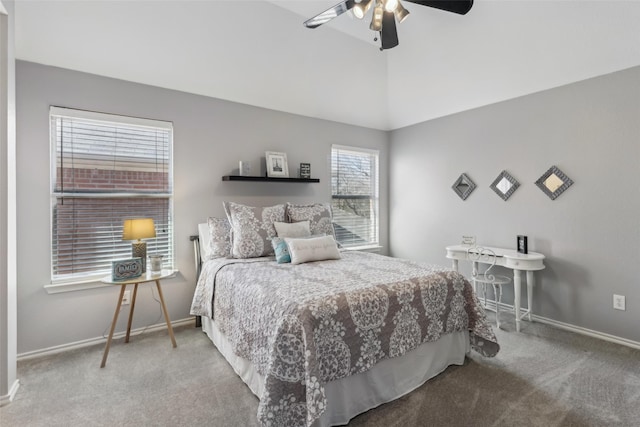 bedroom with lofted ceiling, a ceiling fan, baseboards, and carpet flooring