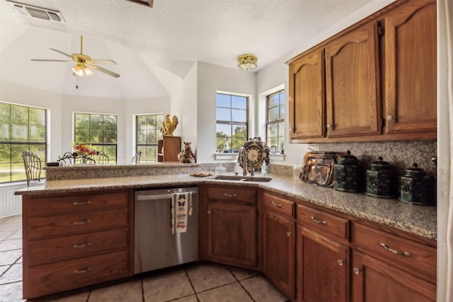 1579 County Road 2008 Unit F, Glen Rose, TX 76043 - kitchen with visible vents, a sink, light tile patterned floors, lofted ceiling, and dishwasher