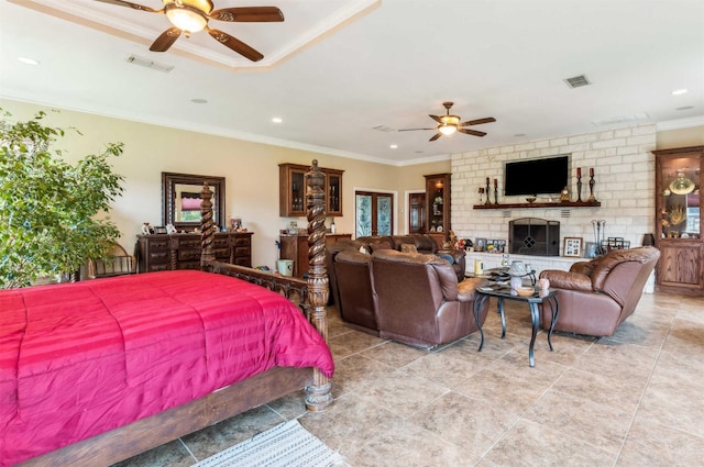 1579 County Road 2008 Unit F, Glen Rose, TX 76043 - bedroom with visible vents, recessed lighting, a fireplace, and crown molding