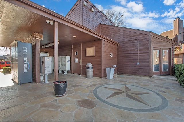 view of patio with mail area and french doors