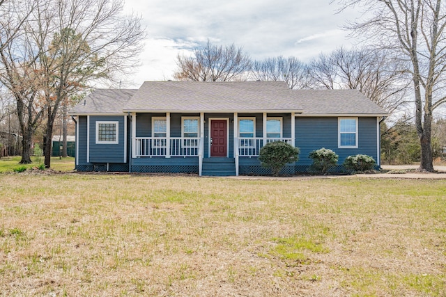 single story home with a porch, a front yard, and a shingled roof