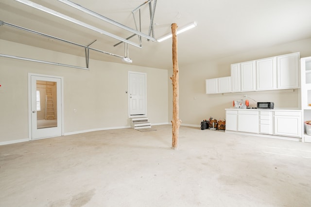 garage featuring baseboards