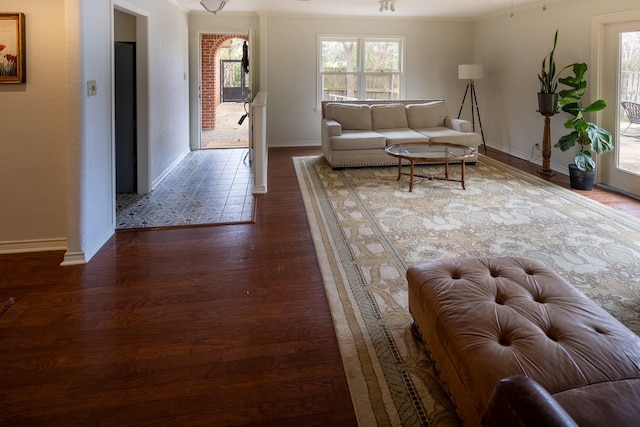 living room with wood finished floors and baseboards