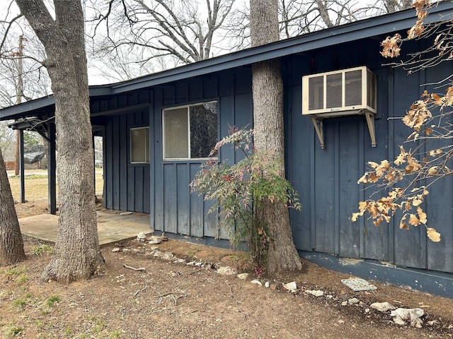 view of property exterior with board and batten siding