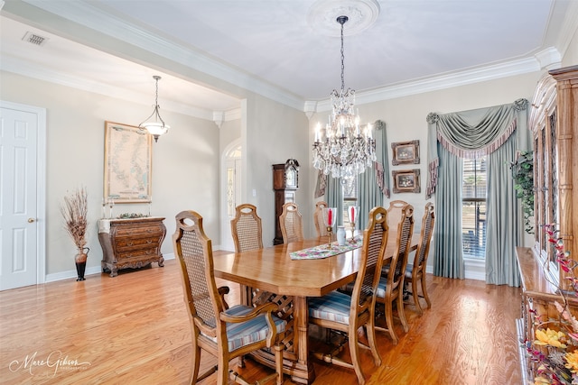 101 Chesterton Ct, Bossier City, LA 71111 - dining space with a chandelier, light wood-type flooring, ornamental molding, and baseboards