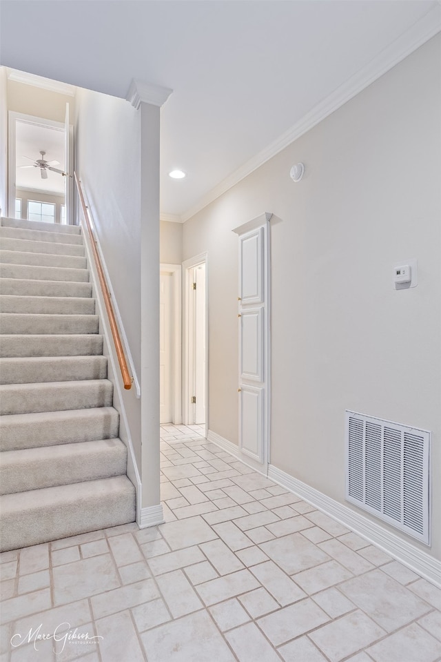 stairway with recessed lighting, a ceiling fan, baseboards, visible vents, and crown molding