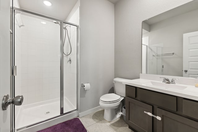 full bath featuring toilet, a stall shower, and tile patterned floors