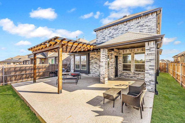 view of patio / terrace featuring a fenced backyard and a pergola